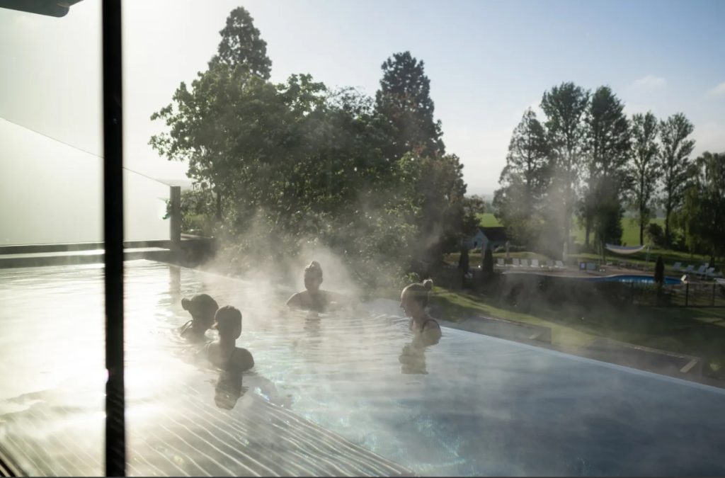 Ragdale Hall Spa outside 4 girls in the pool/hot tub happy.
